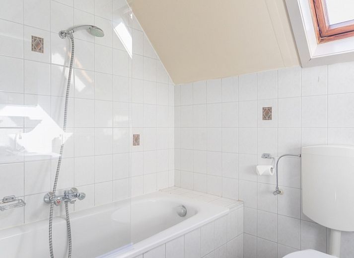 Gezellige woonkamer in Landgoed Springtij - Koetshuis 2, vakantiehuis in De Koog, Texel.