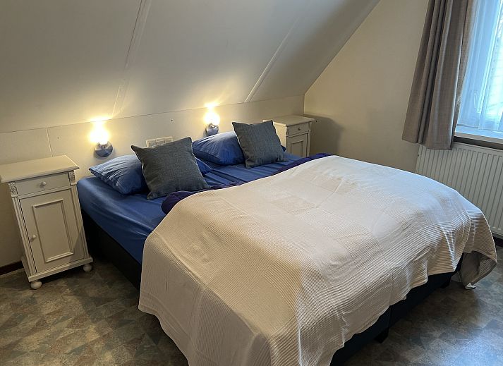 Gezellige woonkamer in Koetshuis 2, vakantiehuis in De Koog, Texel.