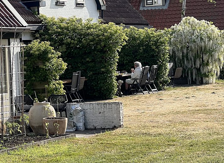 Gezellige woonkamer in Koetshuis 2, vakantiehuis in De Koog, Texel.
