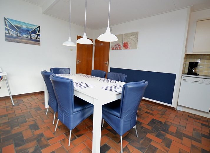 Cozy living room in Orchismient 18 large, De Koog, Texel with modern furnishings and fireplace.