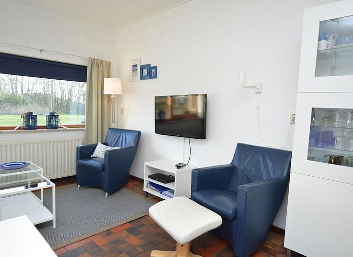 Orchismient 18 klein vakantiehuis met zonnige tuin in De Koog, Texel.