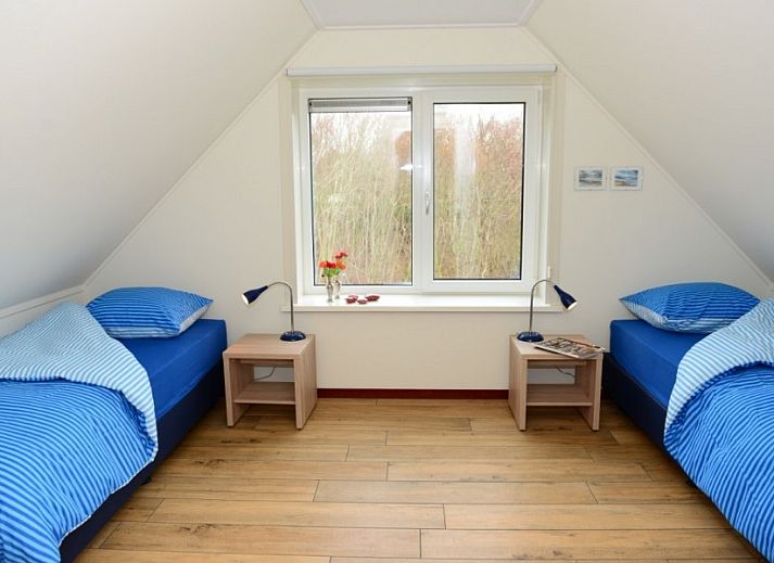 Duinrand Vakantievilla's Type 1 in De Koog, Texel omringd door duinen.