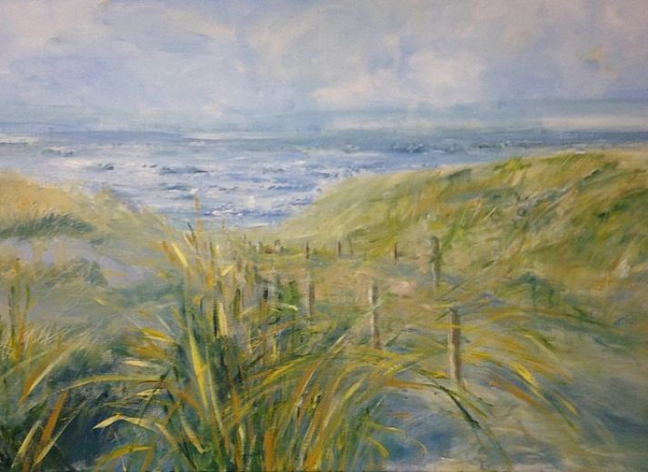 Gemuetliches Wohnzimmer der Texel Villa Duinzicht, Ferienhaus in De Koog, Texel, mit komfortabler Sitzecke.