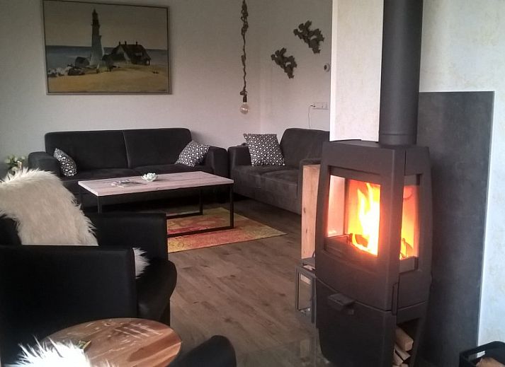 Terrace of Park Verste Coogh vacation home in De Koog, Texel with modern garden table.