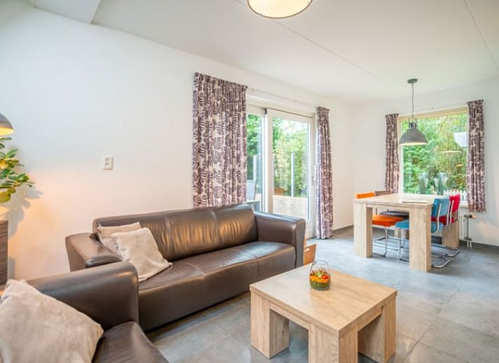 Huisje in De Waal, Texel met speeltuin en groene omgeving, ideale vakantieaccommodatie op de Waddeneilanden.