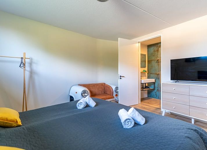 Comfortabele zithoek in Vakantiehuisje in De Waal, Texel, ideaal voor ontspanning.