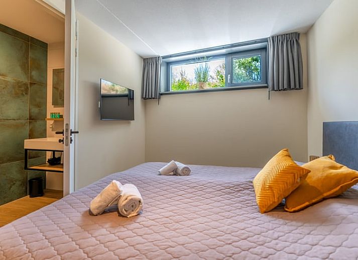 Comfortabele zithoek in Vakantiehuisje in De Waal, Texel, ideaal voor ontspanning.