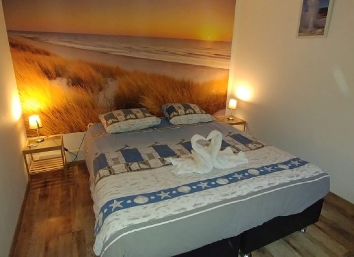 Geniet van de zonnige tuin bij vakantiehuis Gastvrij in Den Burg, Texel. Perfect voor ontspanning op de Waddeneilanden.