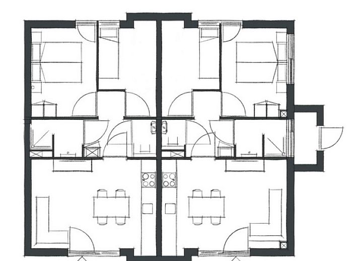 Gemuetliche Sitzecke im Luxury Apartment 4p, Den Burg, Texel mit stilvoller Rattanlampe und frischen Blumen.