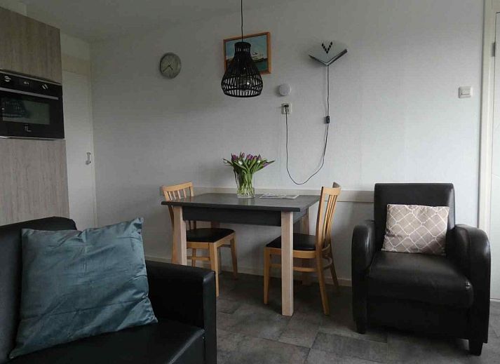 Gezellige woonkamer van NH198 vakantiehuis in Den Burg Texel.