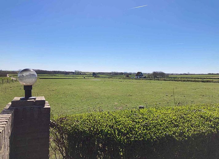 Trampoline in de tuin van NH198 vakantiehuis Den Burg Texel.