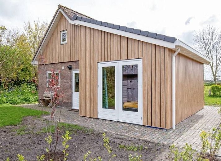 Ferienhaus 5 Persoons in Den Burg Texel mit schoener Terrasse und umgeben von Natur auf den Watteninseln.