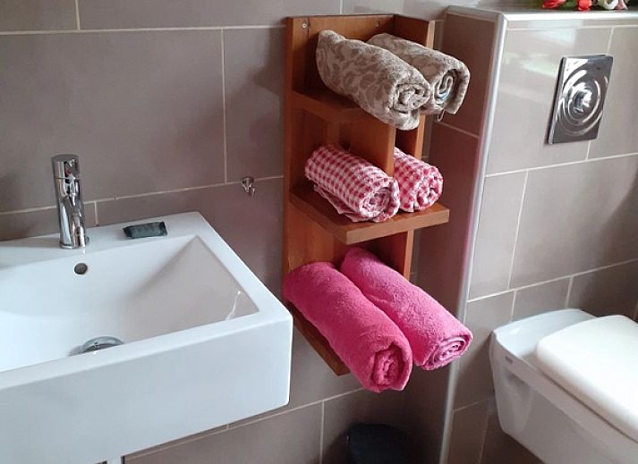 Gezellige keuken van Het Achterhuys in Den Burg Texel met moderne voorzieningen.