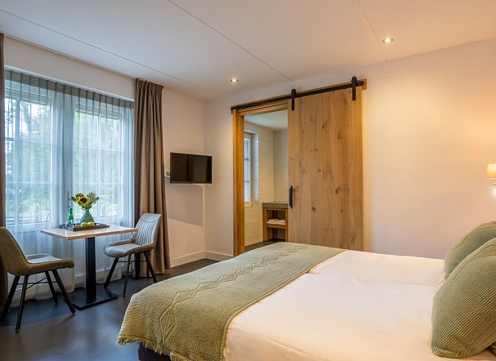Cozy kitchen in Group Residence Nieuw Leven Texel, Den Burg, overlooking the nature of the Wadden Islands.