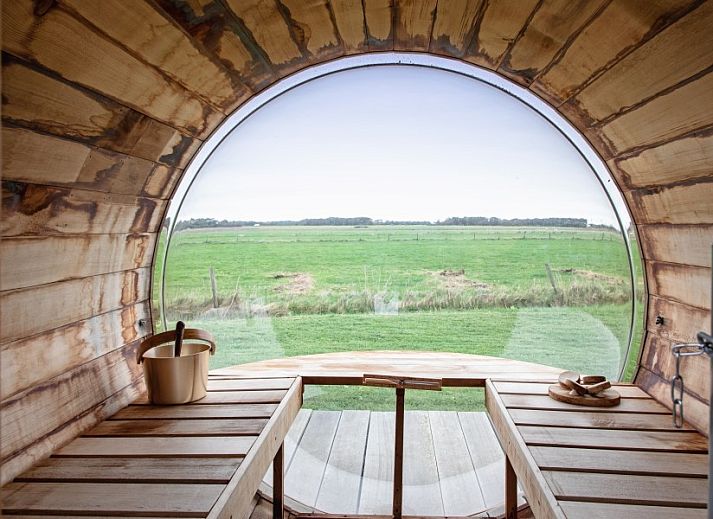 Interior space of Wulpenweid 12 A Lammetje in De Dennen, Texel with comfortable seating area.