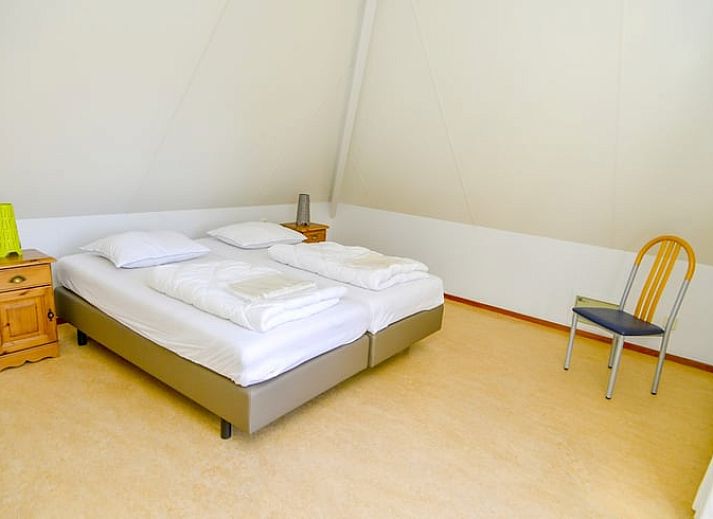 Vakantiehuis in Den Burg entree met groene omgeving op Texel