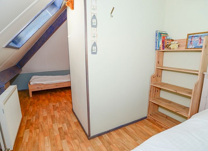 Gemuetliches Wohnzimmer von De Boet, Ferienhaus in Den Hoorn, Texel mit bequemen Sitzgelegenheiten.