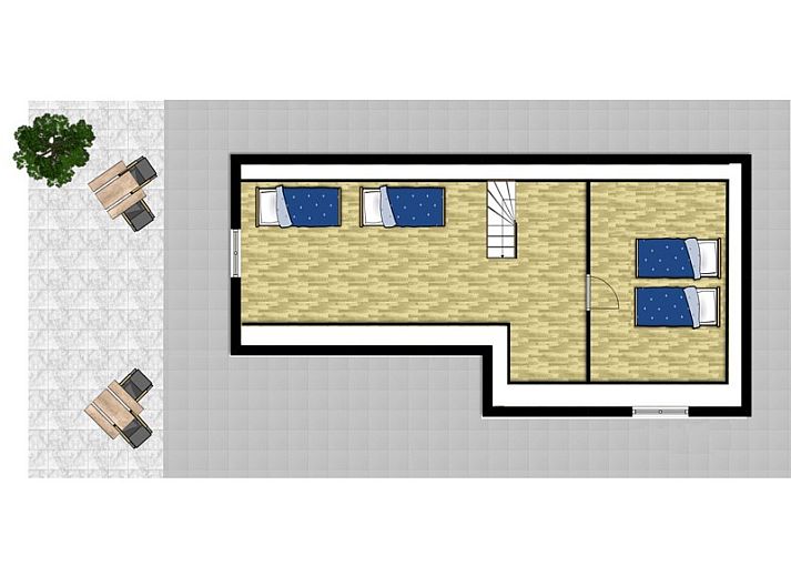 Cozy living room in vacation home Sonja, Texel with comfortable red sofa.