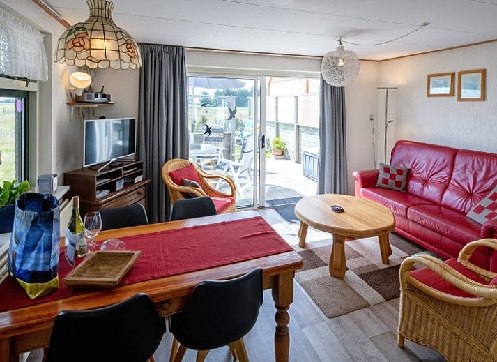 't Huussie vakantiehuis in Den Hoorn, Texel met zonnig terras en groene tuin.