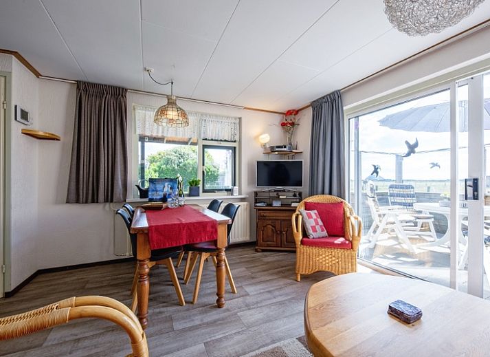 't Huussie vakantiehuis in Den Hoorn, Texel met zonnig terras en groene tuin.