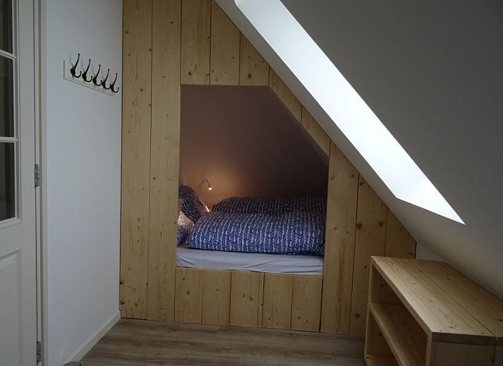 Het Hooivak vakantiehuis met rieten dak in Den Hoorn Texel, charmante landelijke uitstraling op de Waddeneilanden.