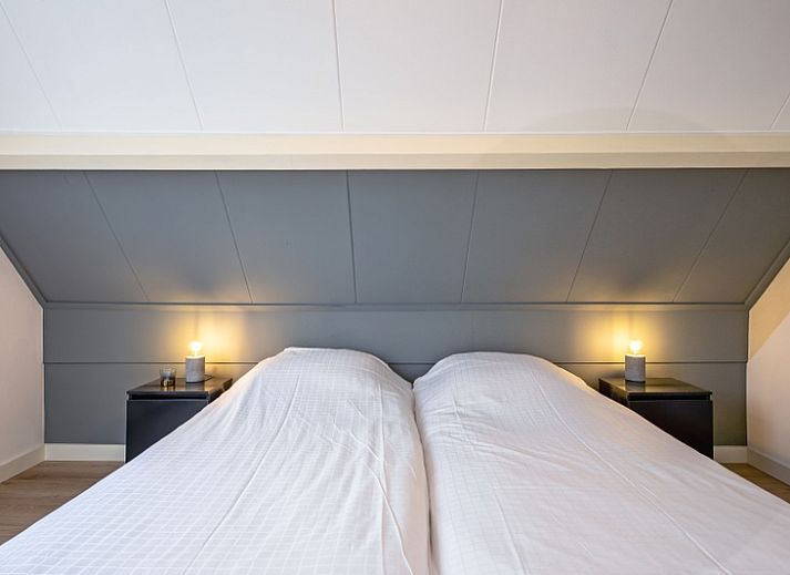 Vorderansicht des Hotel Loodsmans Welvaren - Appartement in Den Hoorn, Texel mit traditioneller Architektur.