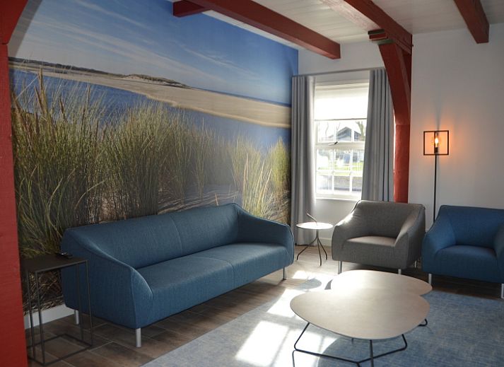 't Wambuis vakantiehuis in Den Hoorn Texel met charmante gevel en landelijke omgeving.