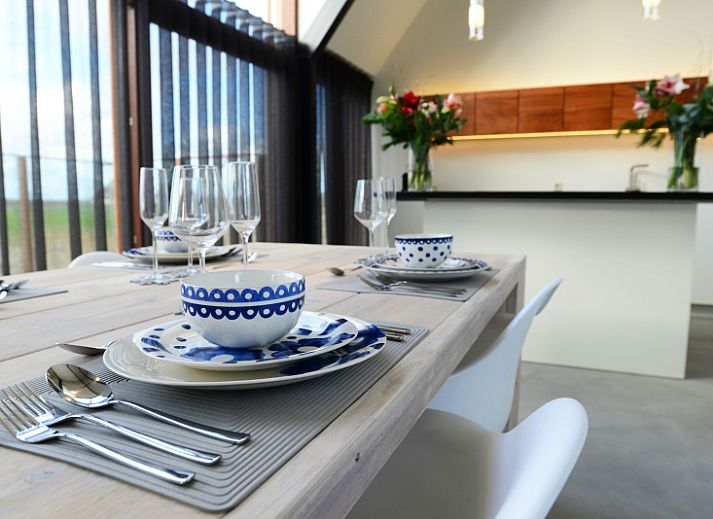 Stijlvolle woonkamer in De Waddenhof, Den Hoorn, Texel, vakantiehuis met comfortabele zithoek.