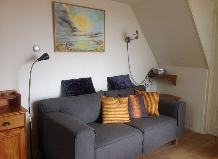 Ferienhaus De Kievit in Den Hoorn Texel, umgeben von gruener Natur.