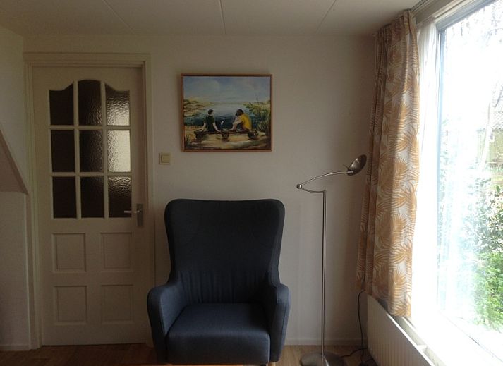 Ferienhaus De Kievit in Den Hoorn Texel, umgeben von gruener Natur.