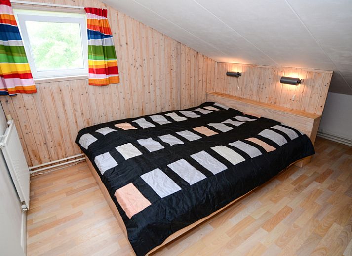 Gemuetliche Sitzecke im Ferienhaus De Kievit Den Hoorn Texel mit bequemem Sofa.