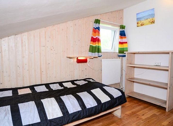 Gemuetliche Sitzecke im Ferienhaus De Kievit Den Hoorn Texel mit bequemem Sofa.