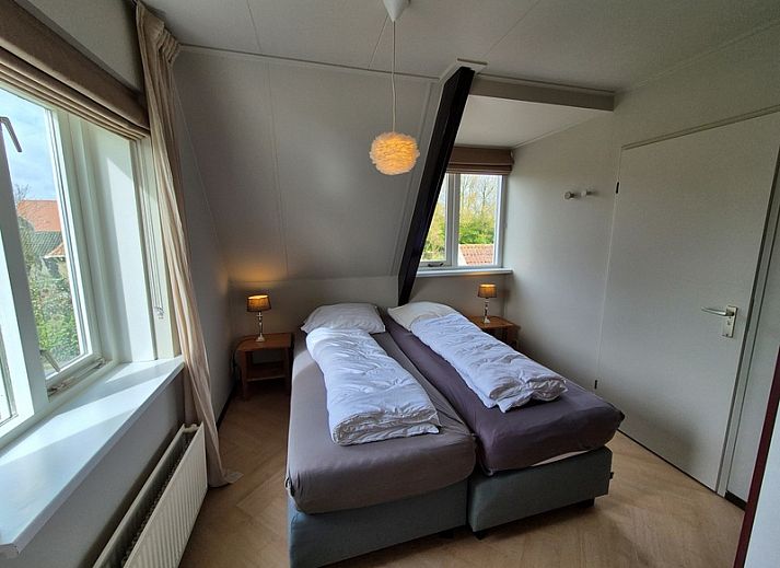 Opkamer vakantiehuis in Den Hoorn, Texel met landelijke tuin en prachtig uitzicht op de Waddeneilanden.