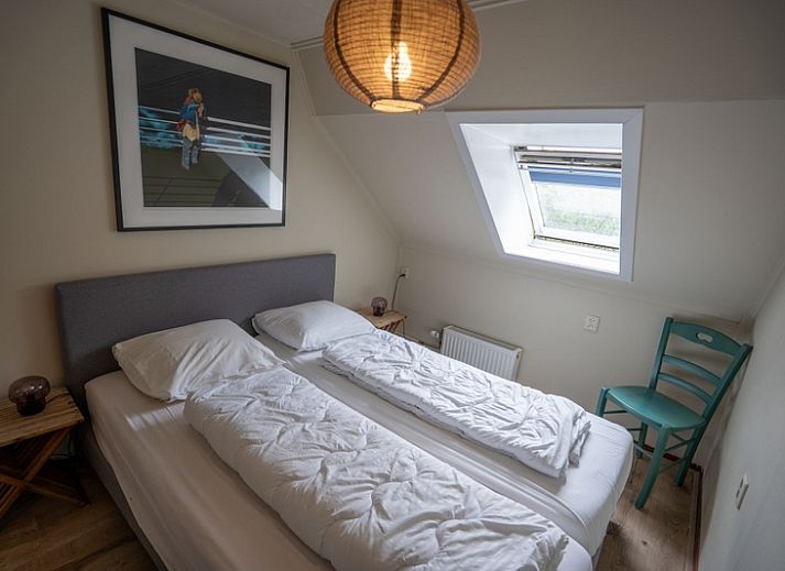 Sonnige Terrasse im Ferienhaus Ants Nest in Den Hoorn Texel mit bequemen Stuehlen