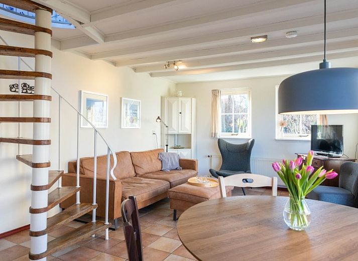 Duiventil vakantiehuis in Den Hoorn Texel met traditionele architectuur en ruime tuin.