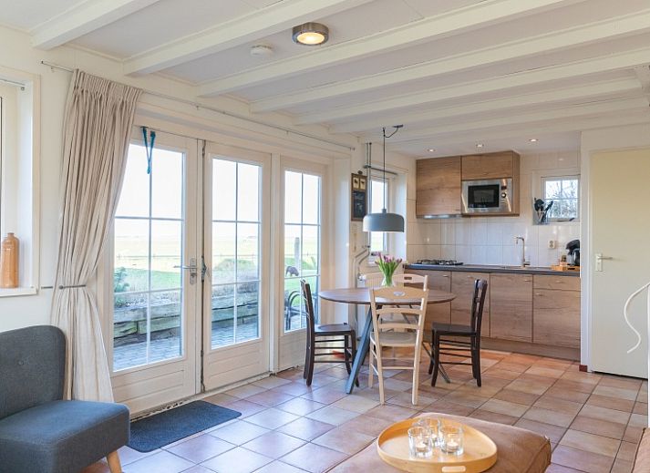 Duiventil vakantiehuis in Den Hoorn Texel met traditionele architectuur en ruime tuin.