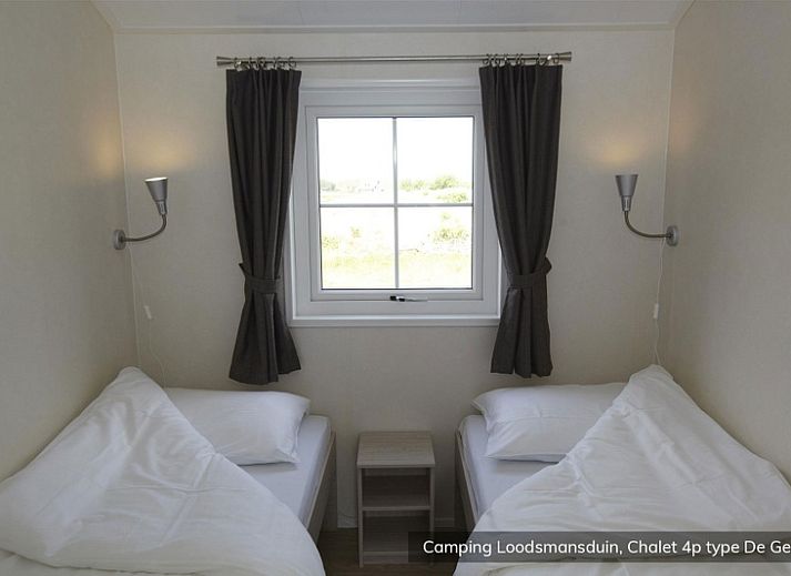 Family-friendly environment of Chalet Geul 4p in Den Hoorn Texel with swimming pool and playground.