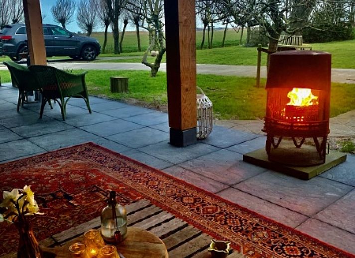 Blick ueber die weiten Felder rund um 't Kaaps Huussie, ein charmantes Ferienhaus in Oosterend, Texel, Watteninseln.