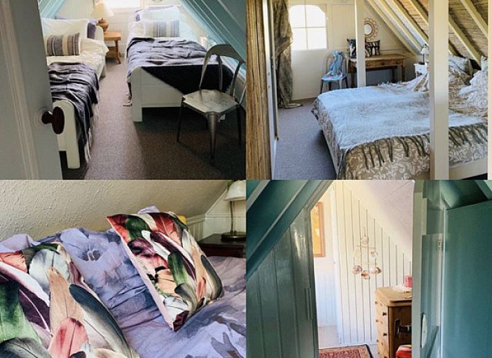 Gemuetliche Veranda im Ferienhaus 't Kaaps Huussie in Oosterend, Texel, ideal fuer entspannende Momente im Freien.