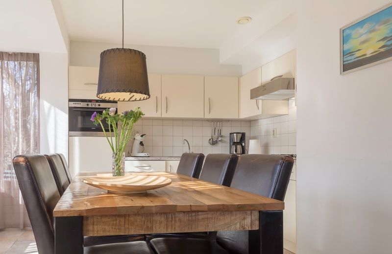 Enjoy the terrace at Type III - No. 21E Storm Gull in Oosterend, Texel, ideal for a vacation home on the Wadden Islands.