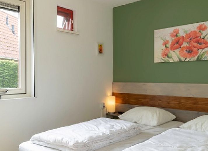 Gezellig vakantiehuis Type II+ - nr. 77 Goudvink in Oosterend, Texel met oprit en groene omgeving.