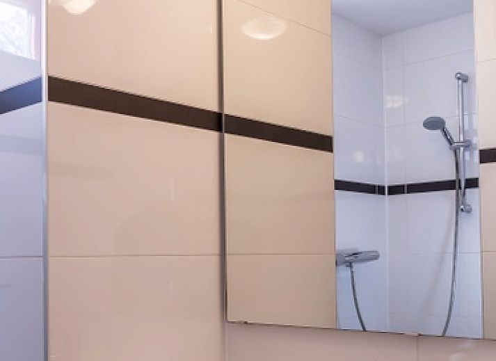 Gezellig vakantiehuis Type II+ - nr. 77 Goudvink in Oosterend, Texel met oprit en groene omgeving.