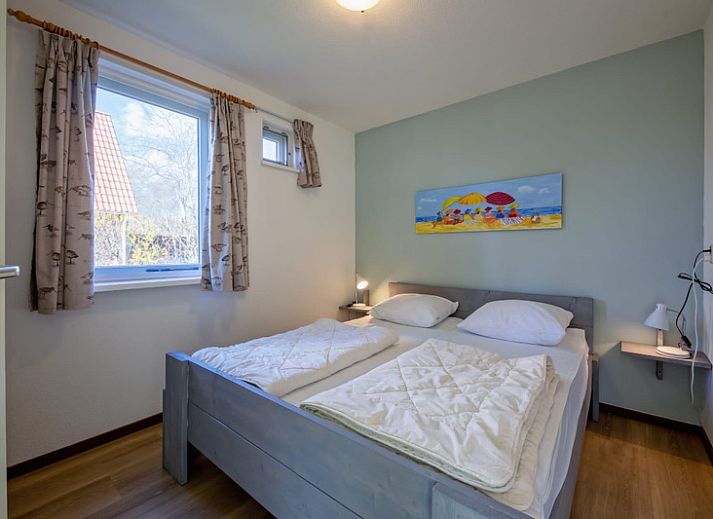 Type II - nr. 43 Stormvogel vakantiehuis met terras in Oosterend, Texel omgeven door groene natuur.