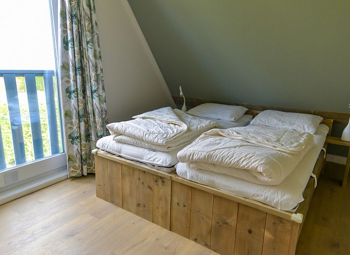 Rustig gelegen Type II+ - nr. 25 Froekie in Oosterend, Texel, Waddeneilanden met ruime tuin en zitgelegenheid.