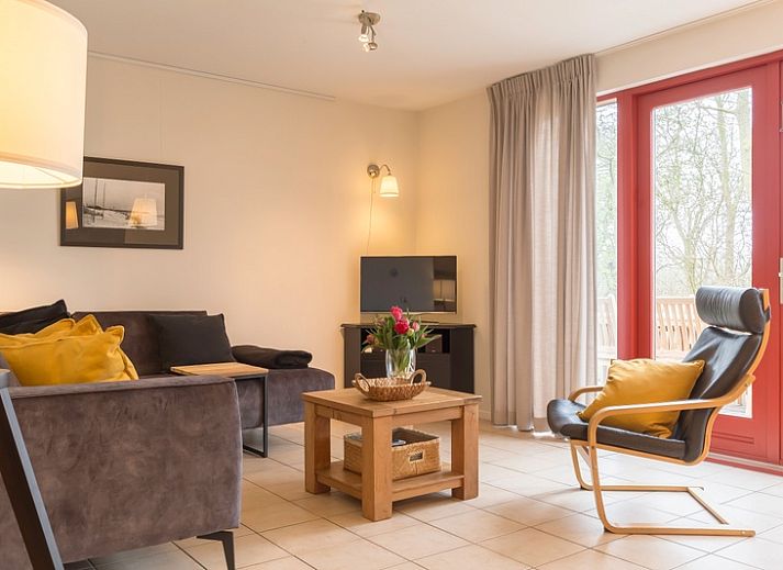 Type I - No. 49 Kragenmaker in Oosterend Texel, charming vacation home with red facade and green garden on the Wadden Islands.