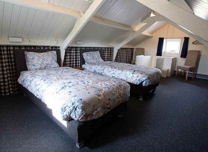 Rustieke omgeving van Hoe bestaat het in Oosterend, Texel met traditionele architectuur.