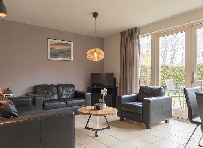 Type I - nr. 33 Braamsluip vakantiehuis in Oosterend, Texel met charmante gevel en groene omgeving.