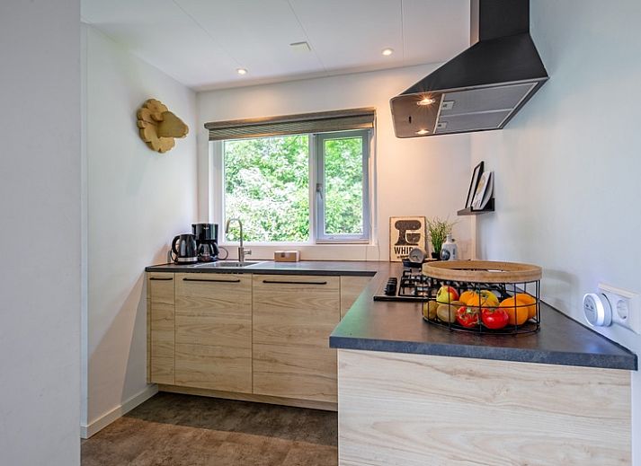 Cozy living room in Bungalowpark De Toes - Zeewier, Oosterend Texel overlooking nature.
