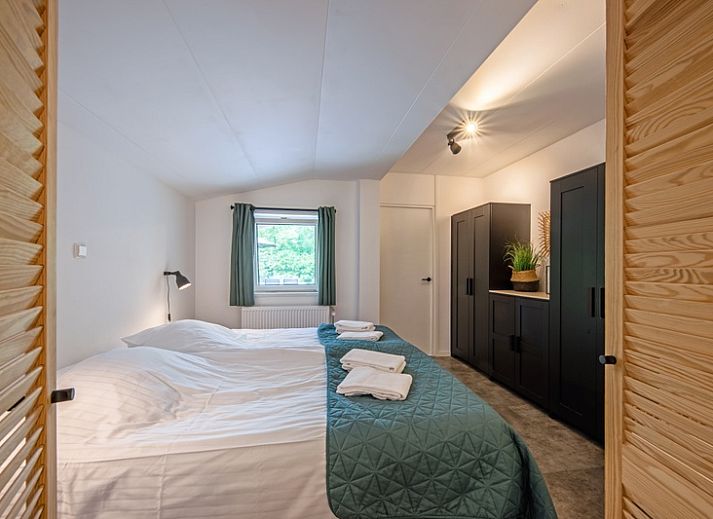 Cozy living room in Bungalowpark De Toes - Zeewier, Oosterend Texel overlooking nature.