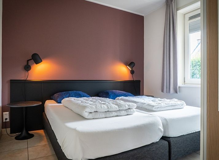 Geniet van het zonnige terras bij Vakantiepark So What, een prachtige bungalow in De Koog, Texel, omringd door natuur op de Waddeneilanden.